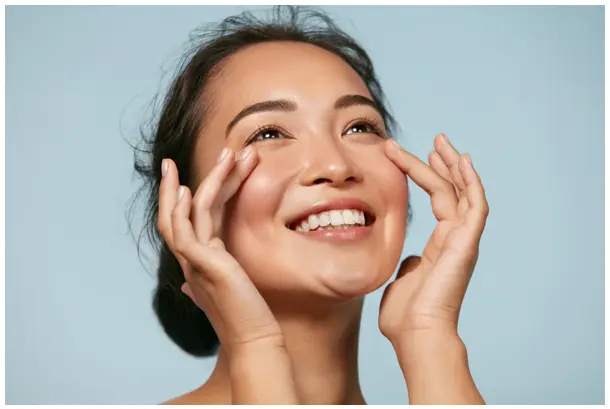 woman smiling with healthy skin