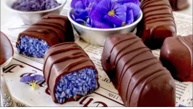 Recipe: Sink your teeth into the goodness of Butterfly Pea Powder Bounty Bars - Hindustan Times Recipe: Sink your teeth into the goodness of Butterfly Pea Powder Bounty Bars - Hindustan Times